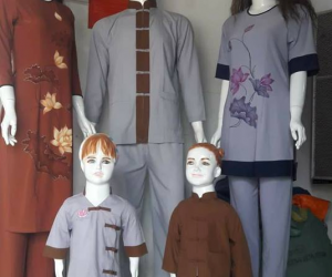 NGƯỜI PHỤ NỮ ĐƯA NGHỀ MAY PHÁP PHỤC VỀ ĐỊA PHƯƠNG